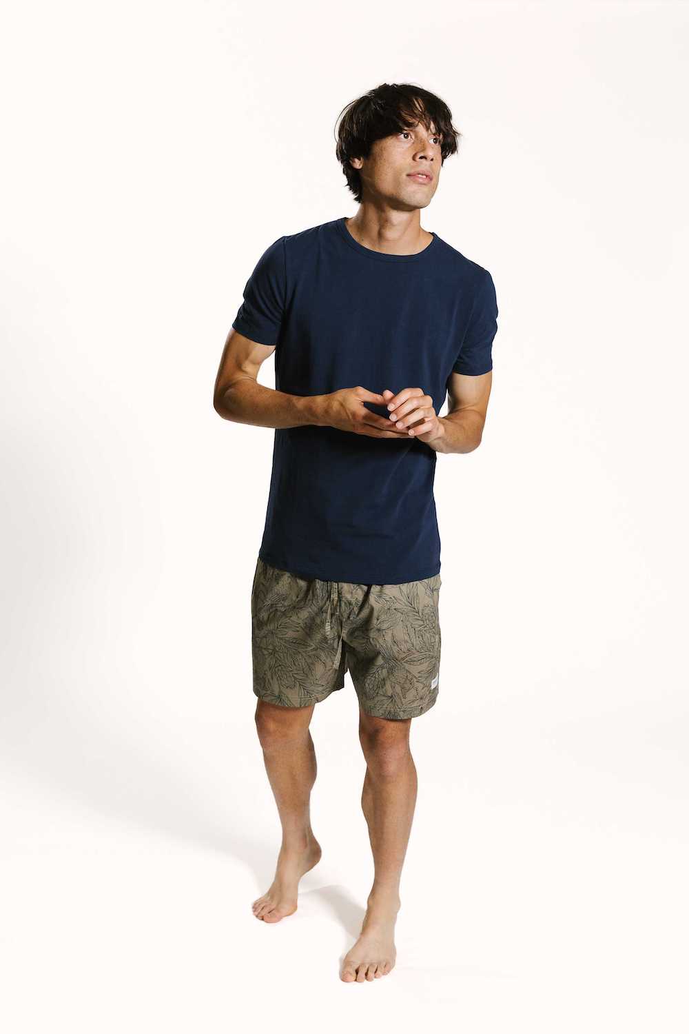 Mens sleepwear shorts in line print paired with dark navy t-shirt