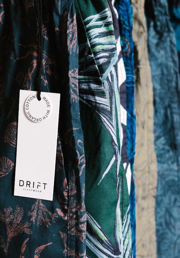 Close up of pyjamas and organic cotton gift tag