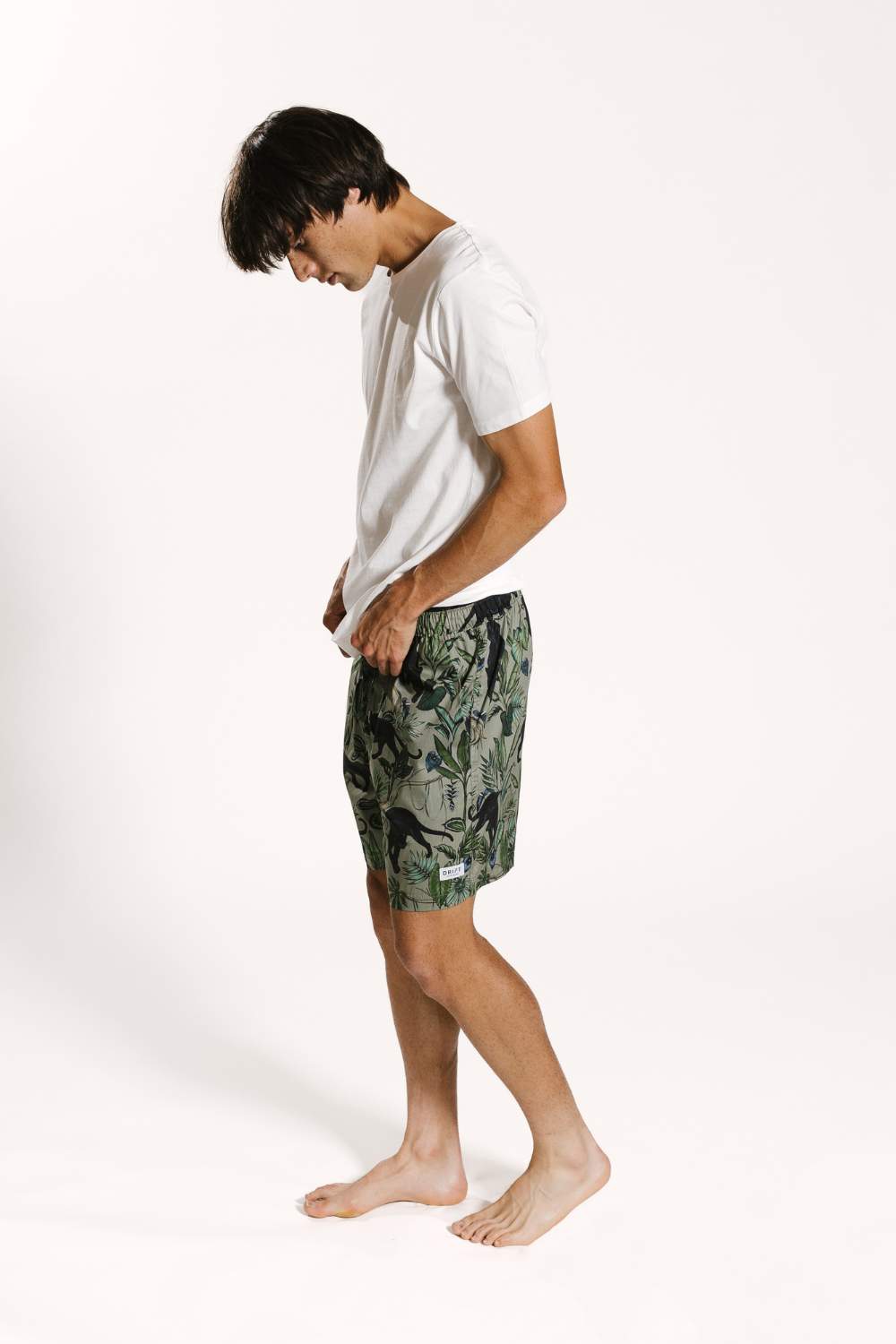 Model wearing a pair of Drift Sleepwear panther printed pyjama shorts set