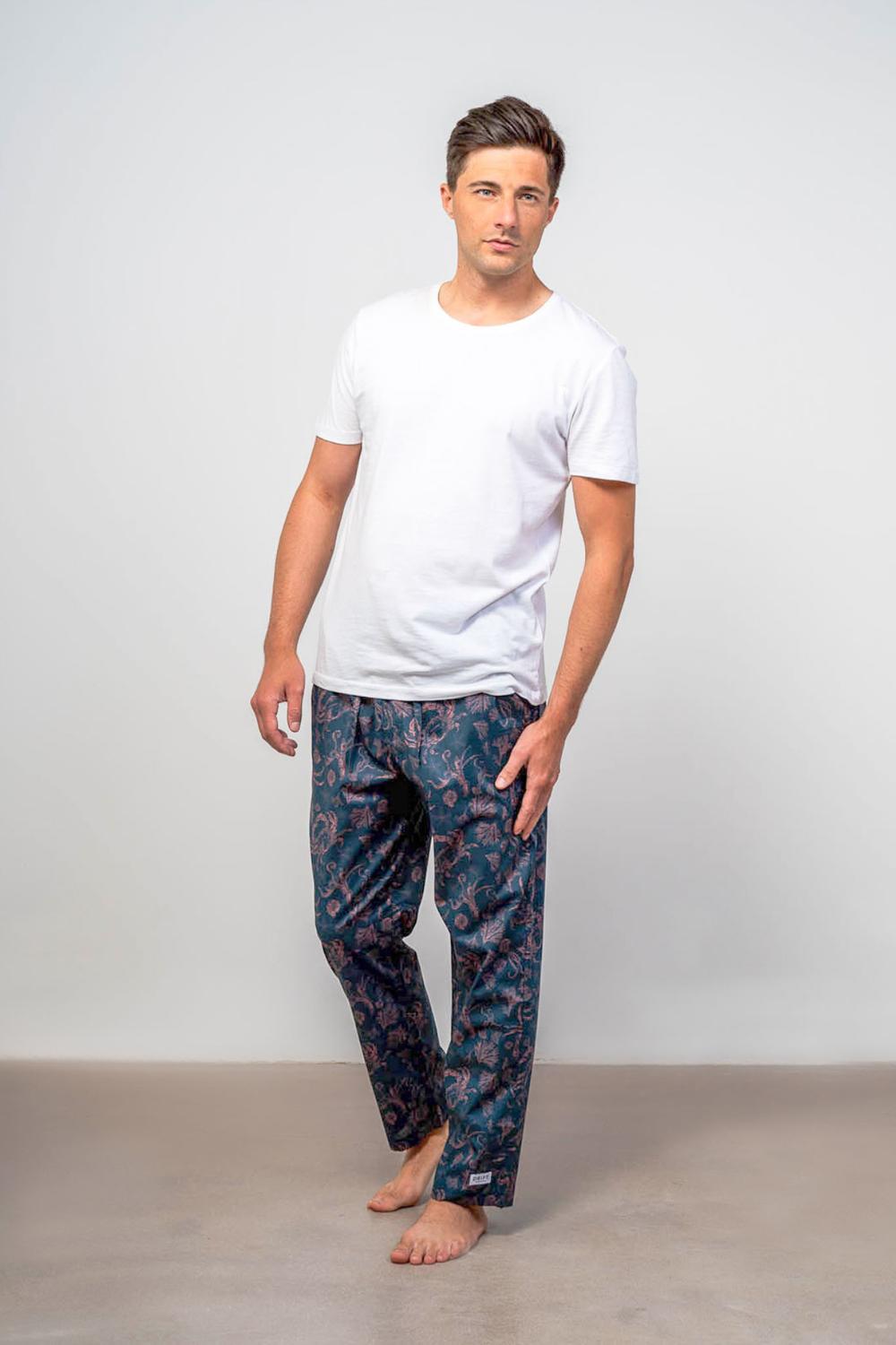 Model wearing long pajama bottoms for men