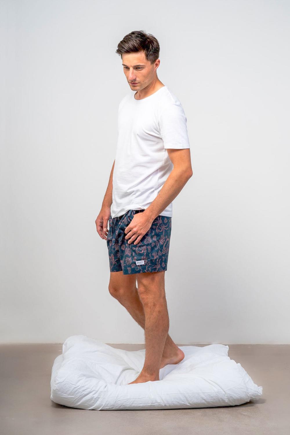 Model wearing luxury pyjama set for men 