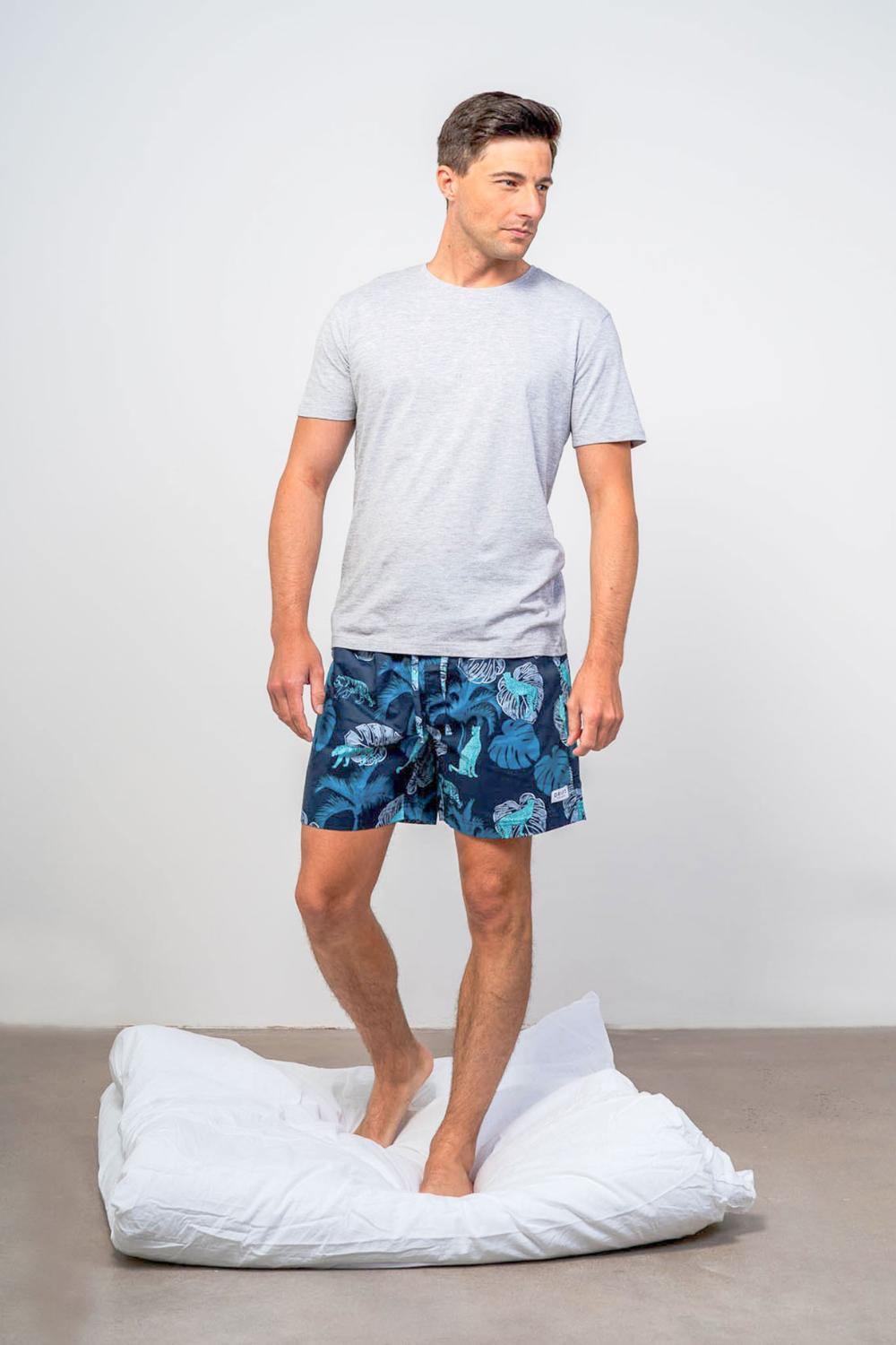 Drift Sleepwear model wearing tropical printed pyjama shorts
