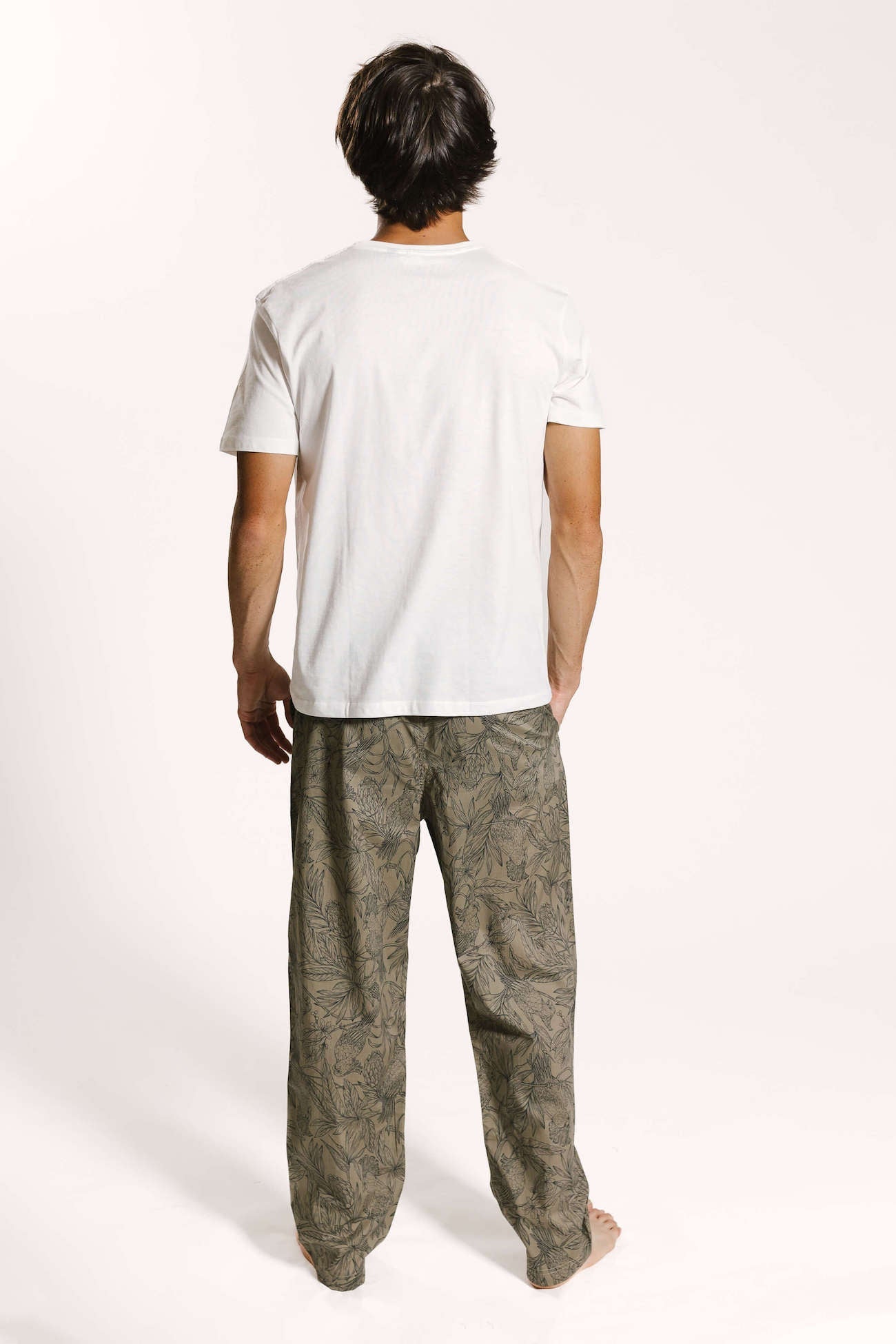 Back of model wearing printed line print sleepwear trousers