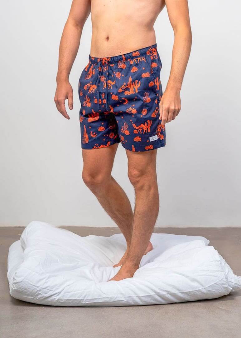 Close up of men's pyjama shorts desert inspired print