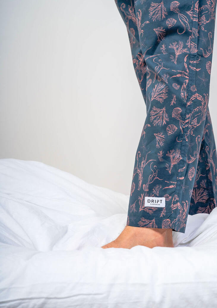Close up of model wearing drift sleepwear pyjama bottoms
